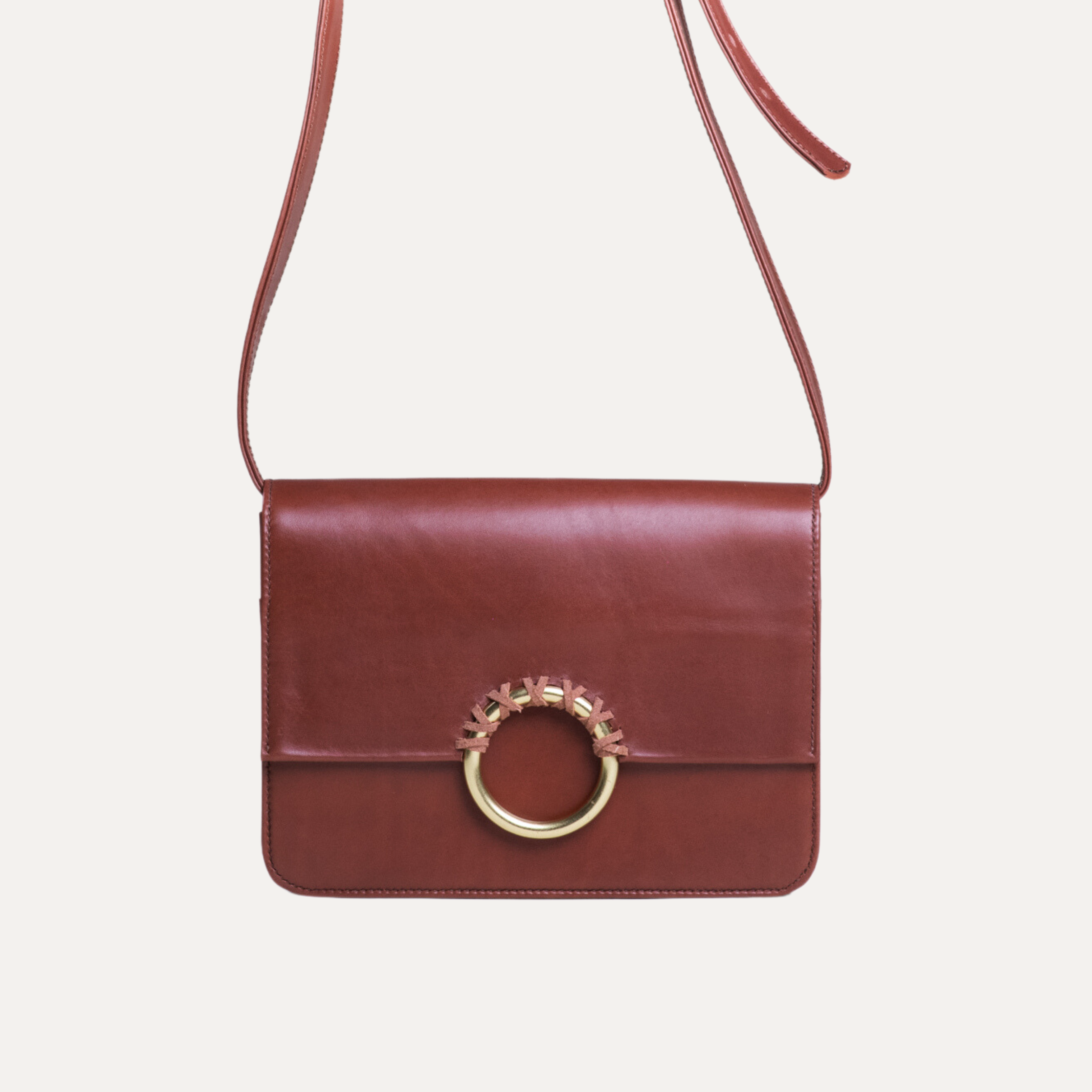Handmade leather crossbody bag in chestnut brown with gold hardware